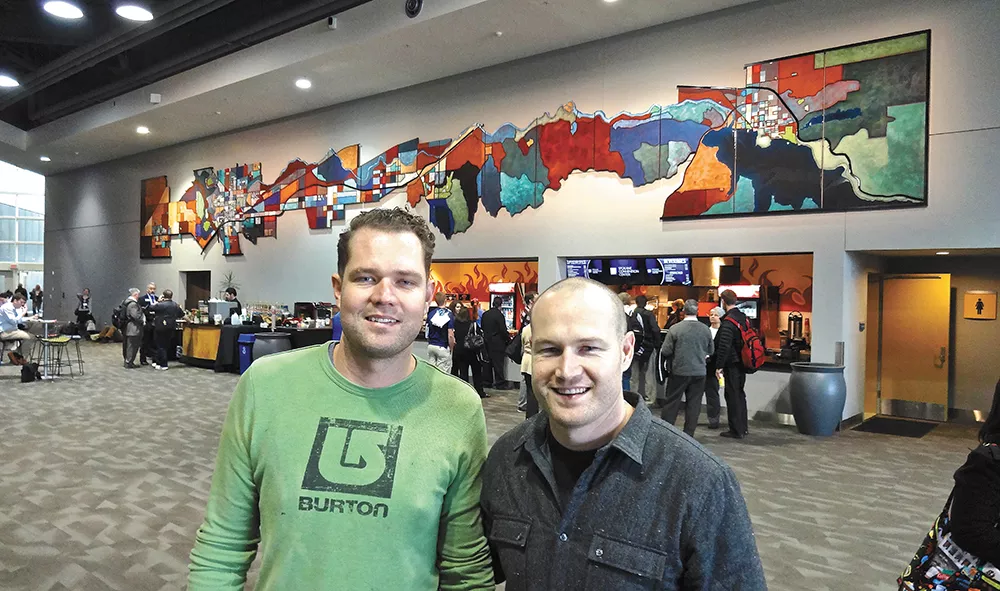 Jason (left) and Ben Joyce at the Spokane Convention Center with the large piece they created. - PHOTO COURTESY BEN JOYCE