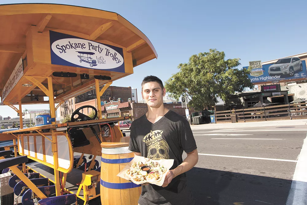Jason Sallas, the kitchen manager at Borracho Tacos & Tequileria, one of the stops located on the Spokane Party Trolley's new "Tasty Pedaler" tour. - YOUNG KWAK