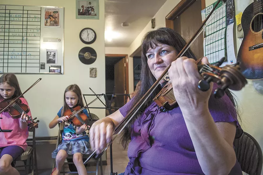 JayDean Ludiker leads a group lesson at her studio in Spokane Valley. - SARAH WURTZ