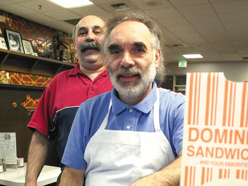Joe Domini, with brother Tom in the background, is ending his career in the sandwich business. - CHRIS BOVEY