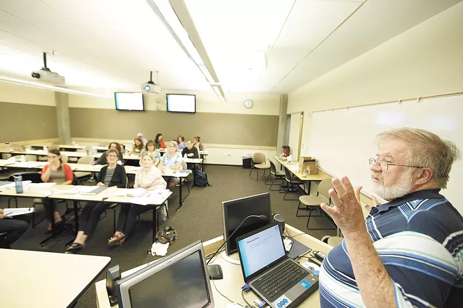John Murphy leads a Mental Health First Aid class earlier this year at WSU Spokane. - YOUNG KWAK