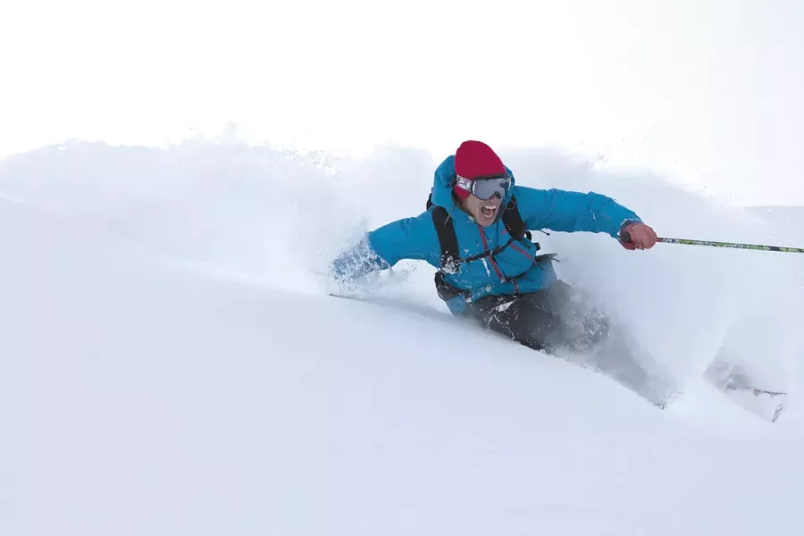 John Stifter says of skiing: "It kind of gives you a reprieve from all the madness."
