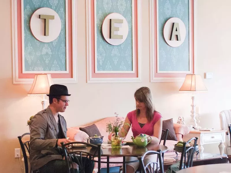 Kalan Piukkula and Joshua Swerin enjoying tea at Taste and See Tea - LORETTA SURMA