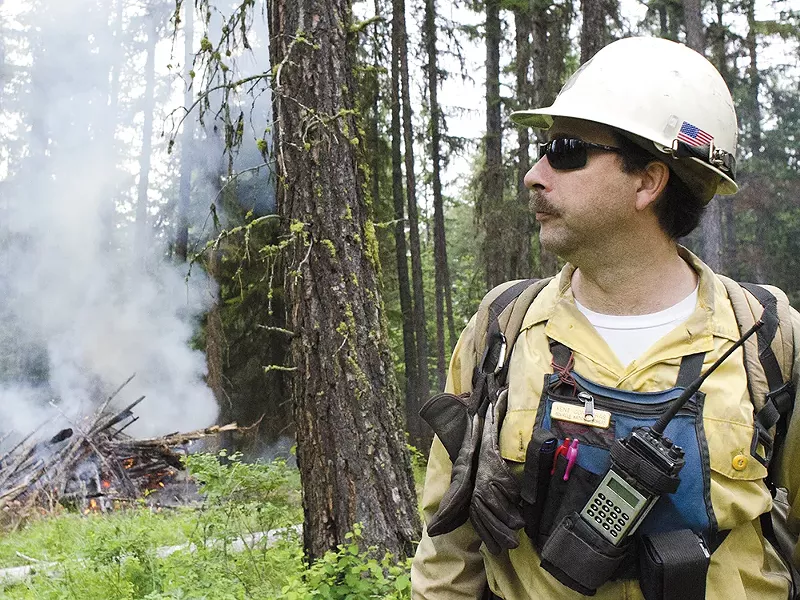 Kent Contreras, with the Forest Service, helps oversee a recent wildfire training exercise near Usk, about an hour north of Spokane. - JACOB JONES