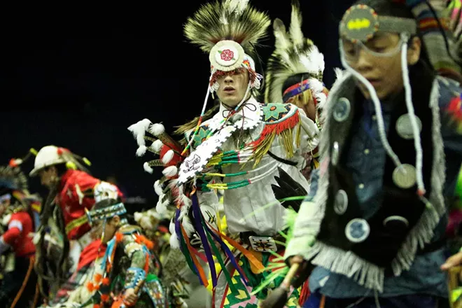 Logan Quaempts, center, of the Cayuse Tribe of the Confederated Tribes of the Umatilla Indian Reservation, dances. - YOUNG KWAK