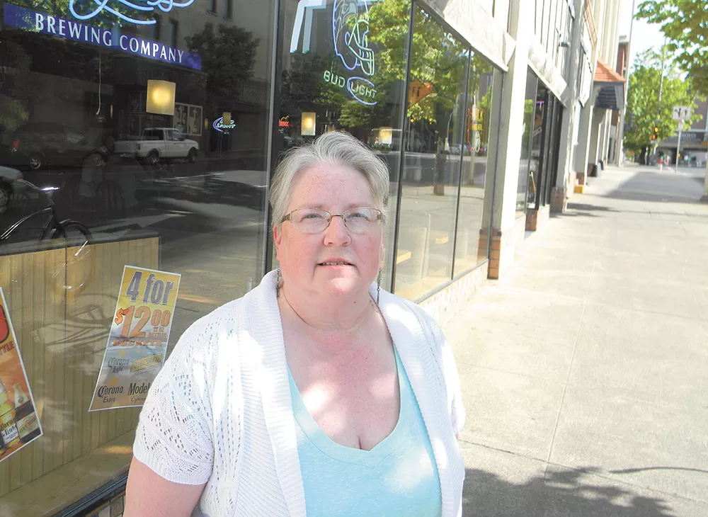 Maggie Lankford, who lives in downtown Spokane, struggles to make rent each month. She's not alone. - JAKE THOMAS
