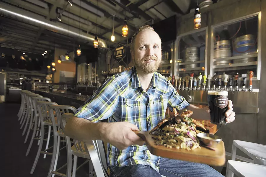 Manito Tap House owner Patrick McPherson employs a staff of highly educated beer experts to help match a pint with your meal. - YOUNG KWAK
