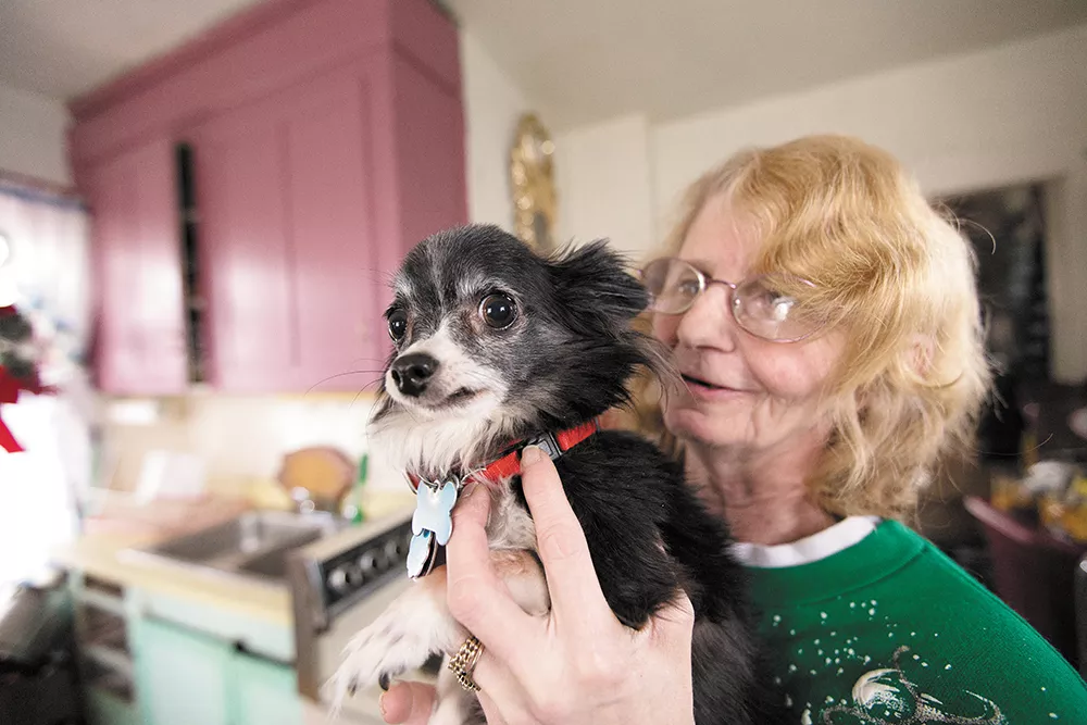 Marsha Erskine and her Chihuahua named Chico. "Right now my little animals ... are the only thing that's keeping me going." - YOUNG KWAK