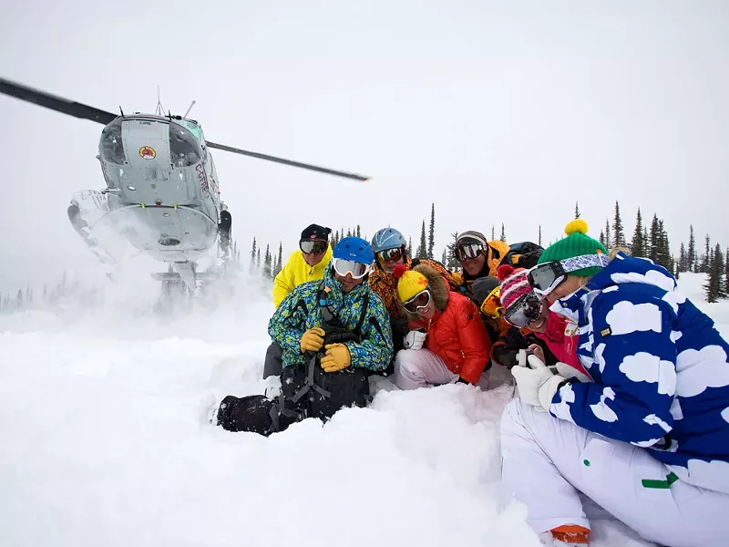 Me and the gang wait for our Selkirk Tangiers chariot to whisk us back up for another run. The heli-ride is almost as fun as the skiing - SHERRI HARKIN