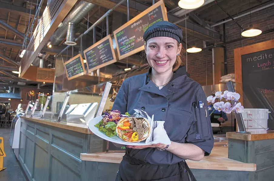 Mediterrano cook Merry Migliuri with the restaurant's gyro. - SARAH WURTZ