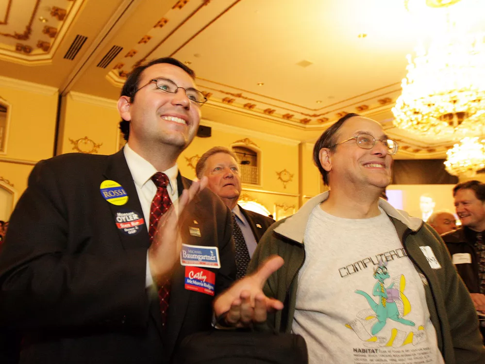 Michael Cathcart, left, cheers election results. Catchart managed successful state candidate Michael Baumgartner's camapaign. - YOUNG KWAK