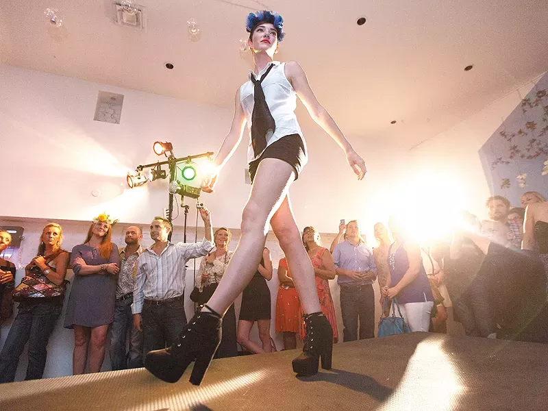 Models display the headwear of Olive Boone Custom Millinery, designed by Erin Haskell. - YOUNG KWAK