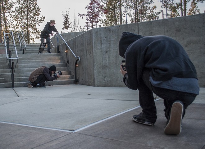 Visintainer, Marko and Nate Akers, front, set up a shot for a trick. - SARAH WURTZ