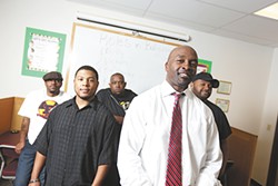 Tommy Williams, second from the right, trains students to combat bullying. - YOUNG KWAK