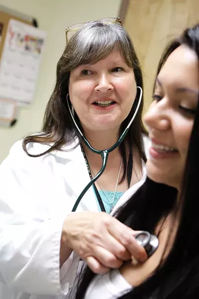 Nurse Vinetta MacPherson sees patients at NATIVE Health of Spokane; with new federal funding, shell be able to see even more. - YOUNG KWAK