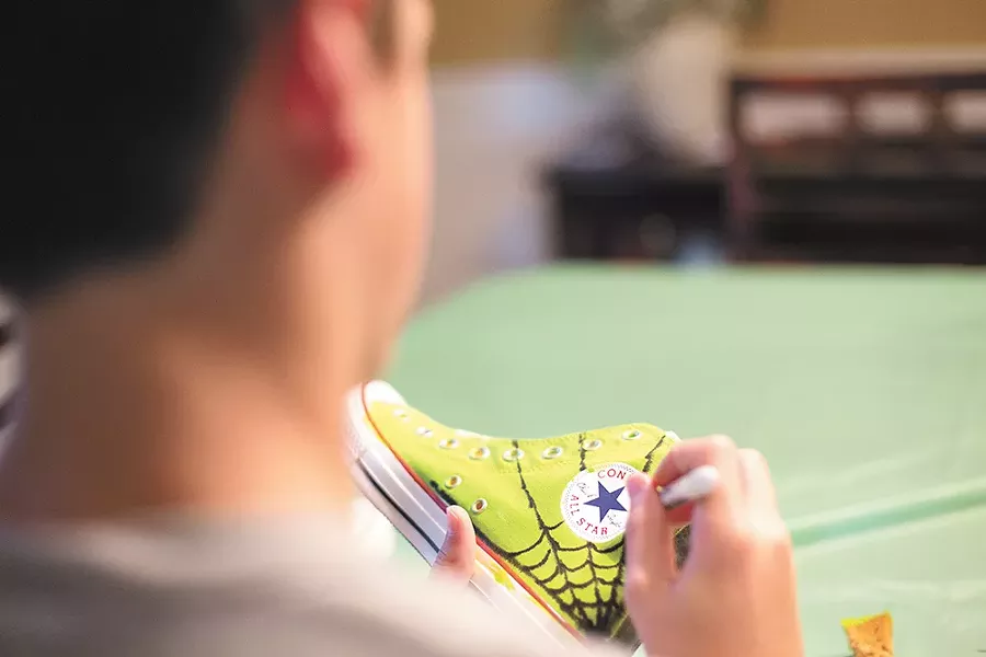 Painted shoes from Art Matters Spokane's youth project are to be exhibited this weekend at Luxe Ballroom. - YOUNG KWAK