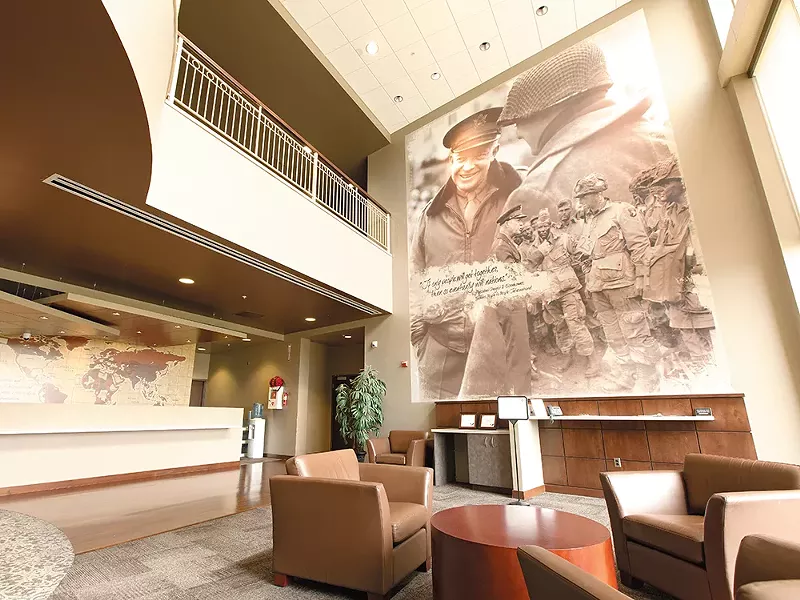 People to People\'s brick-and-glass, 133,000-square-foot offices. - YOUNG KWAK