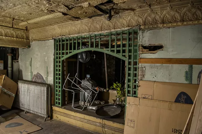 The remains of what once was the Cactus Room, a speakeasy, located in the basement of Dania Furniture. As the building has undergone renovations this year, workers have reported strange things happening here and throughout the rest of the store. - SARAH WURTZ