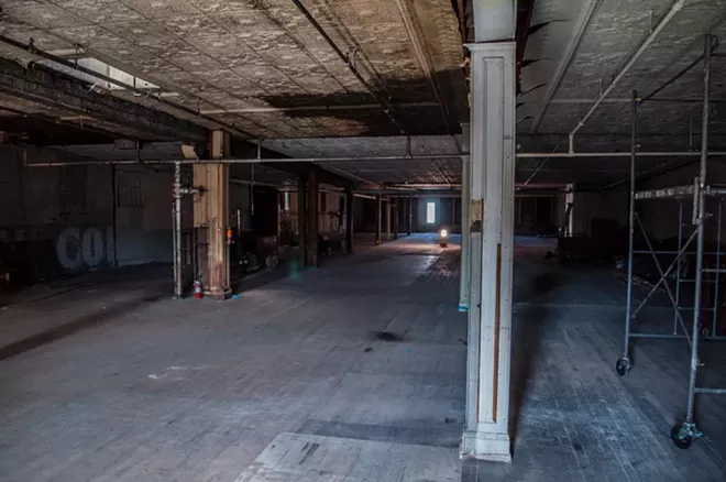 Construction workers have told Dania's employees that strange things have been happening on the fourth floor, such as lights being turned off when no one else reportedly has been around. - SARAH WURTZ