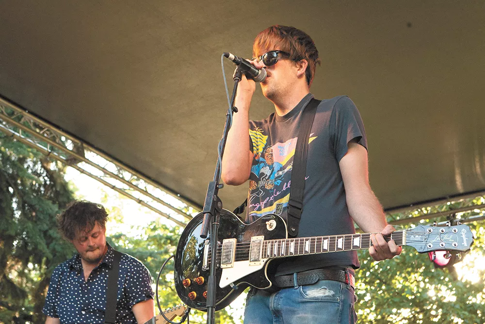 Pine League frontman Tyler Aker, right, and guitarist Scottie Feider at this year's Pig Out in the Park. - MEGHAN KIRK