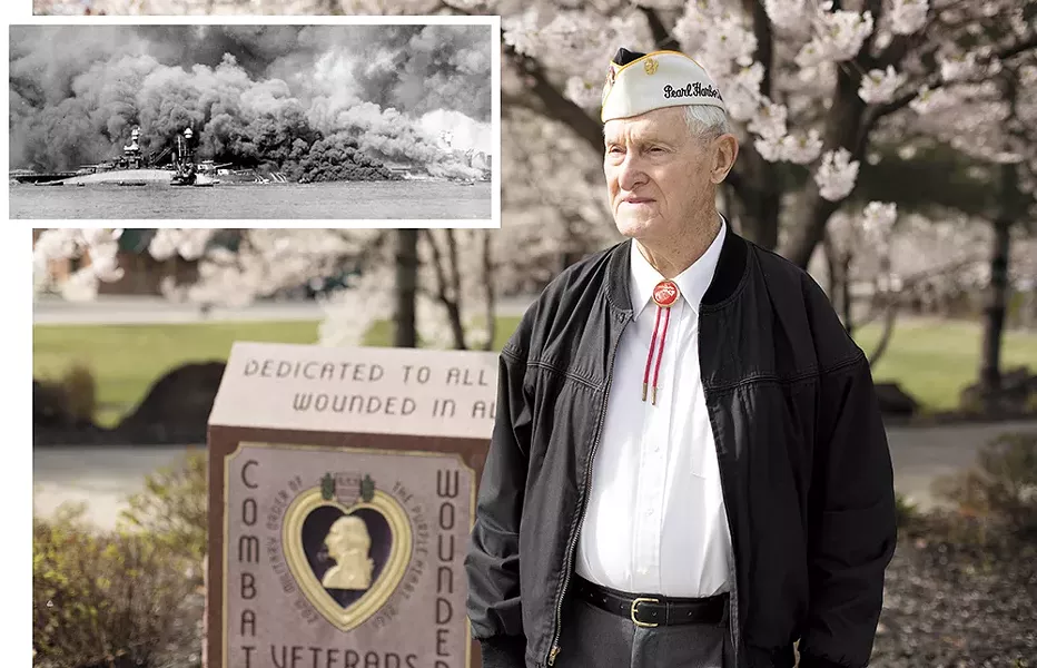 Ray Garland at the Purple Heart Memorial outside the Spokane Veterans Memorial Arena. INSET: The half-sunk, burning - USS Oklahoma on Dec. 7, 1941, just as Garland would have seen it. - YOUNG KWAK