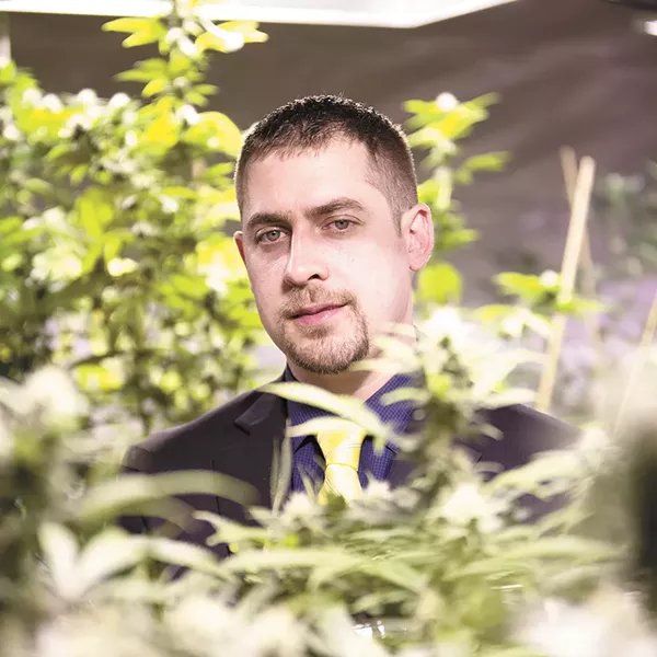 Sean Green, 32, owns medical marijuana dispensaries in Spokane and Seattle and received the state's first recreational marijuana producer/processor license. - YOUNG KWAK
