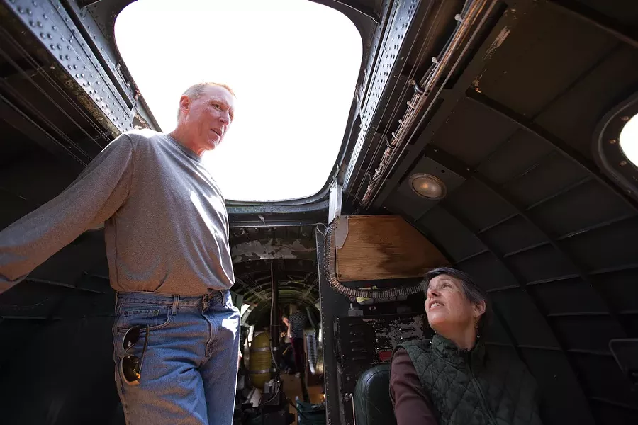 Siblings Patrick Wolf, left, and Janet Hara sit inside the plane. Their uncle Phillip Wolf served as a tail gunner in a B-17 during World War II in the U.S. Army Air Corps. - YOUNG KWAK