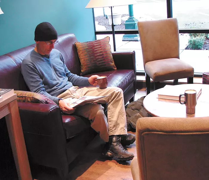 Sigurd Panke enjoys an eggnog latte at Well-Read Moose. - YOUNG KWAK