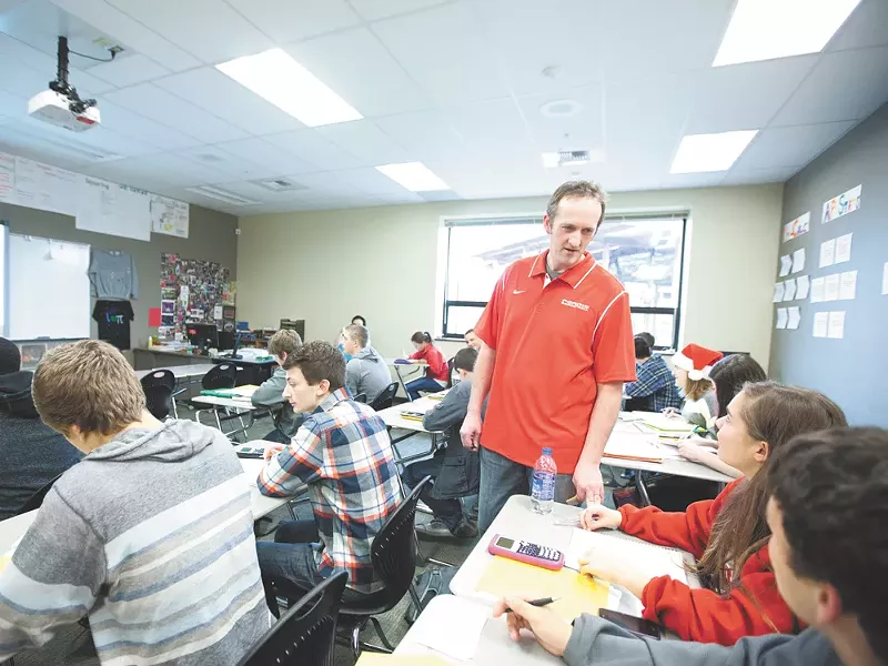 Teacher Tom Rye, center, during an honors pre-calculus class. - YOUNG KWAK
