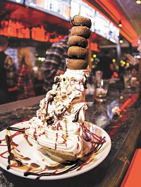 The Globe Bar and Kitchen's Mile-High Donut Pie. - JOE KONEK