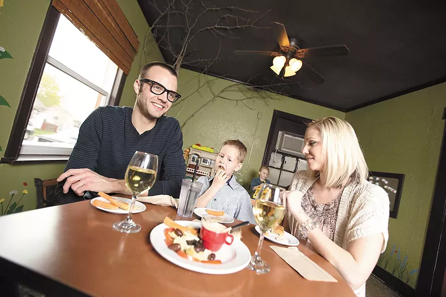 The Little Garden Cafe is known for its kid-friendly happy hour. - YOUNG KWAK