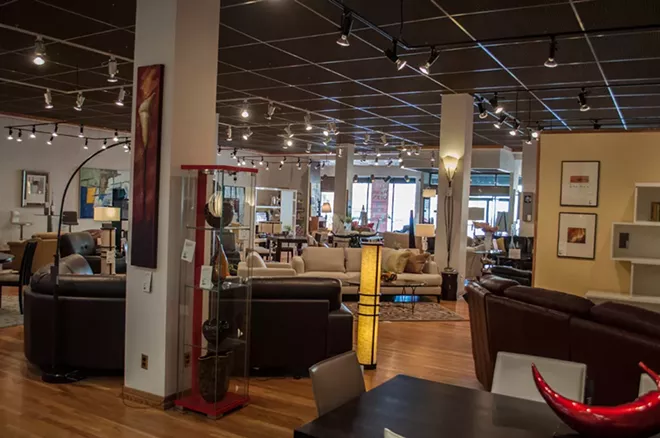 The first floor showroom at Dania Furniture, where employees have reported strange incidents like beds being unmade overnight and shadowy figures walking around. - SARAH WURTZ
