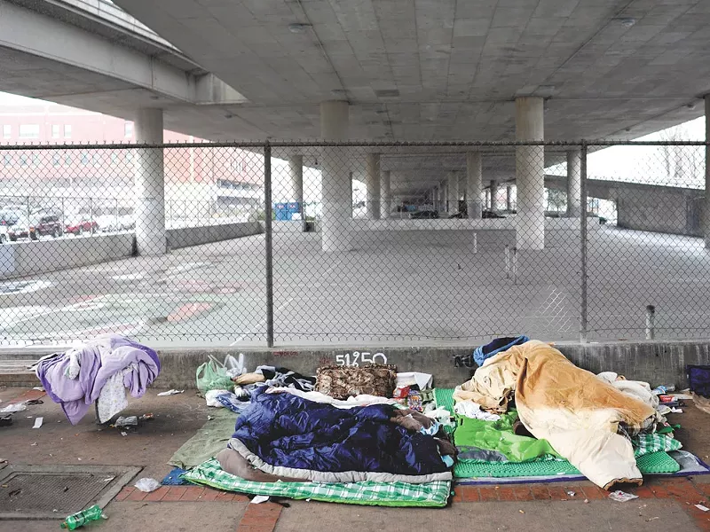 The scene under the freeway in downtown Spokane last Friday. - CHRISTIAN WILSON