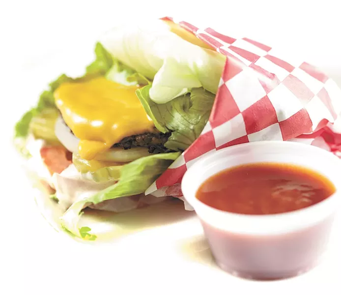The Surf Shack's lettuce-wrapped burger features ketchup made without high-fructose corn syrup. - YOUNG KWAK