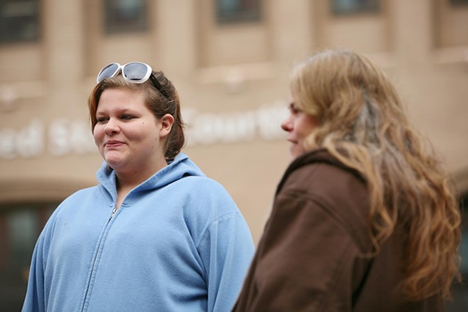 15-year-old Maranda Braschers, left, and her mother Rhonda stand in front of the Thomas S. Foley U.S. Courthouse in Spokane, Wash. on Thursday, November 15, 2012. As an 8-year-old in 2006, Maranda witnessed police confronting Otto Zehm at a Zip Trip store. - YOUNG KWAK