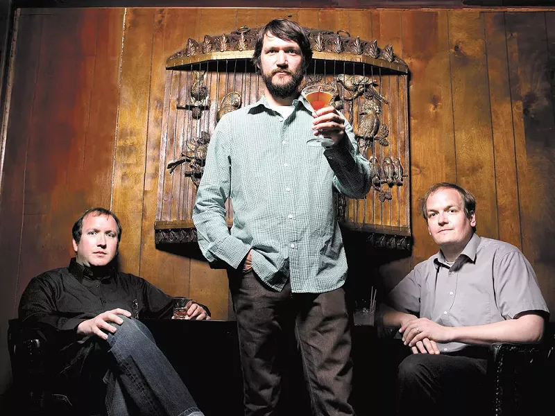 Tim Kasher (center) and Cursive