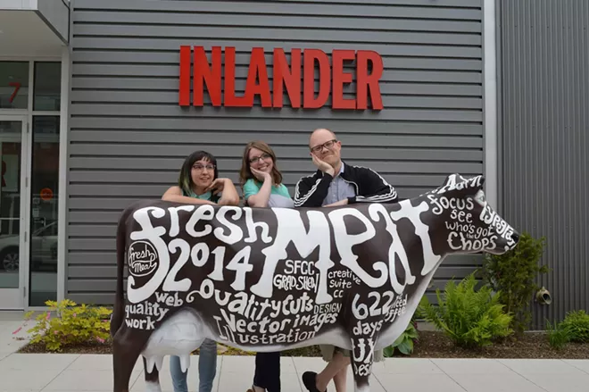 Bovine, the SFCC graphic design portfolio show mascot, stops by to pose with Inlander staffers. - LIORAH WICHSER