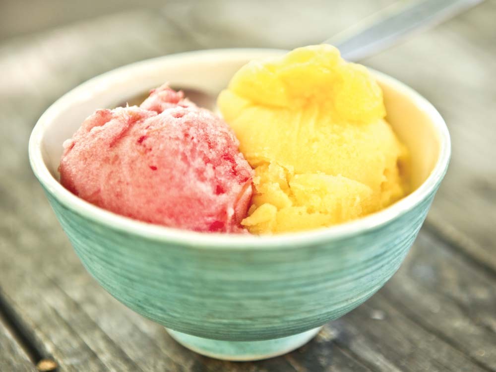 Two of Brain Freeze's refreshing summer flavors: strawberry and mango sorbet - JORDAN BEAUCHAMP