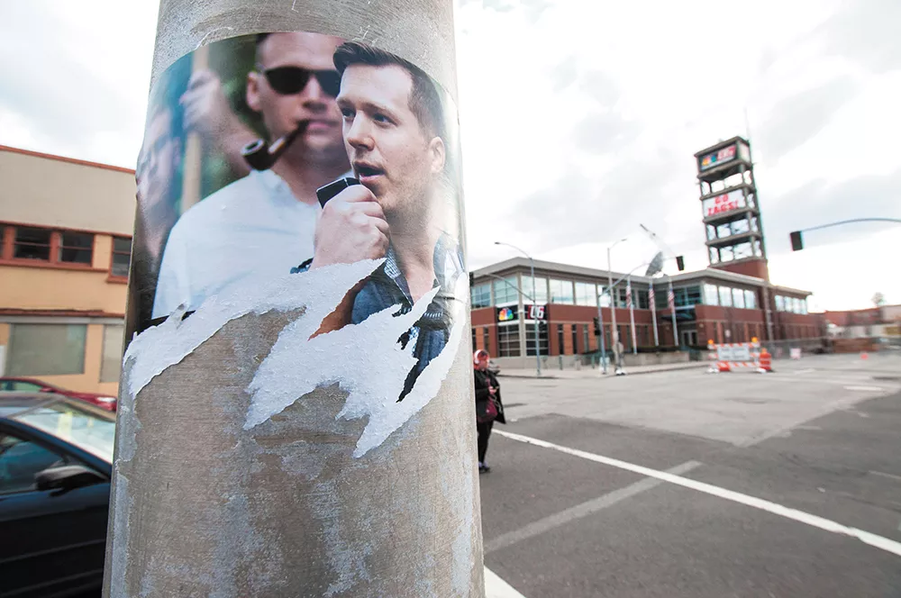 Identity Evropa propaganda posters were swiftly torn down after they were posted in downtown Spokane in March. - DANIEL WALTERS PHOTO