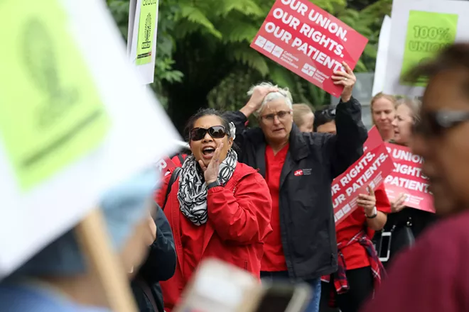 Members of the California Nurses Association protest in San Francisco on Wednesday, June 27, 2018, after a Supreme Court ruling seen as a major blow to organized labor. In a 5-4 decision, the court ruled that government workers cannot be required to pay for collective bargaining, which could cost public unions tens of millions of dollars. - JIM WILSON/THE NEW YORK TIMES
