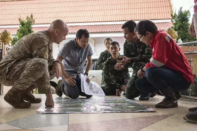 Airmen from the U.S. Indo-Pacific Command meet with Thai military officials to assist in the rescue mission. - AIR FORCE PHOTO BY CAPT. JESSICA TAIT