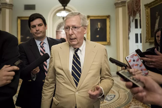 Senate Majority Leader Mitch McConnell (R-Ky.) speaks to reporters on Capitol Hill in Washington, July 16, 2018. McConnell, who rarely grants hallway interviews in the Capitol, uttered three terse sentences: “The Russians are not our friends. I’ve said that repeatedly, I say it again today. And I have complete confidence in our intelligence community and the findings that they have announced.” - ERIN SCHAFF/THE NEW YORK TIMES
