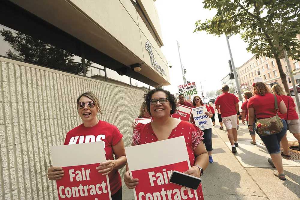 Spokane Education Association President Katy Henry (right) says teacher pay raises are critical to maintaining a talented workforce. - YOUNG KWAK