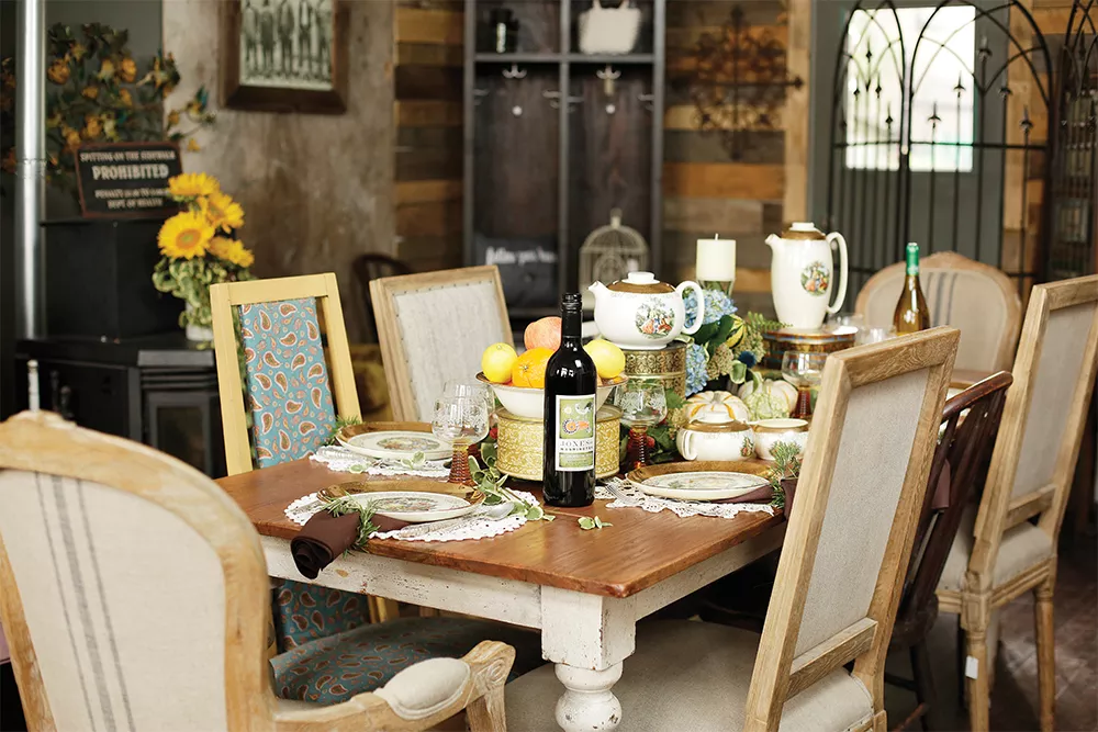 Farm Salvation's Gerri Johnson's vintage china feels fresh and friendly when combined with earthy elements — above, a fruit bowl and a scattering of gourds offer an autumn touch. - YOUNG KWAK