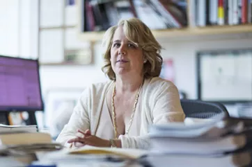 Roberta Kaplan, one of the lawyers whose firm is representing the anonymous plaintiffs in a suit against President Donald Trump filed Oct. 29, 2018, in New York, Aug. 10, 2015. The new lawsuit accuses Trump, his company and three of his children of using the Trump name to entice vulnerable people to invest in sham business opportunities. - DAMON WINTER/THE NEW YORK TIMES