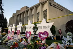 A makeshift memorial on Tuesday morning, Oct. 30, 2018, outside the Pittsburgh synagogue named Tree of Life, where 11 congregants were shot to death on Saturday morning. President Donald Trump is to visit Pittsburgh on Tuesday. - HILARY SWIFT/THE NEW YORK TIMES