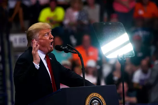 President Donald Trump speaks during a campaign rally in Estero, Fla., Oct. 31, 2018. As President Trump and his allies have waged a fear-based campaign to drive Republican voters to the polls, far-right communities have parsed his statements, looking for hints of their influence. - DOUG MILLS/THE NEW YORK TIMES