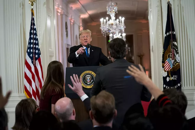 President Donald Trump during a heated exchange with CNN reporter Jim Acosta at a news conference about the results of the midterm elections, at the White House in Washington, Nov. 7, 2018. CNN sued the Trump administration on Nov. 13 in an effort to reinstate the press credentials of Acosta, escalating a dispute that has highlighted the increasingly tense dynamic between Trump and the news media. - DOUG MILLS/THE NEW YORK TIMES