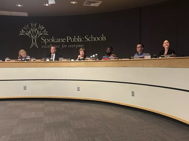 The Spokane Public Schools Board of Directors and superintendent Shelley Redinger (right). - WILSON CRISCIONE PHOTO