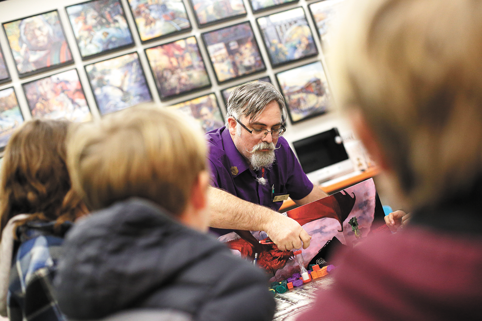 RPG Research Vice President John Welker leads Dungeons & Dragons sessions for kids twice a month at Spark Central in Kendall Yards. - YOUNG KWAK